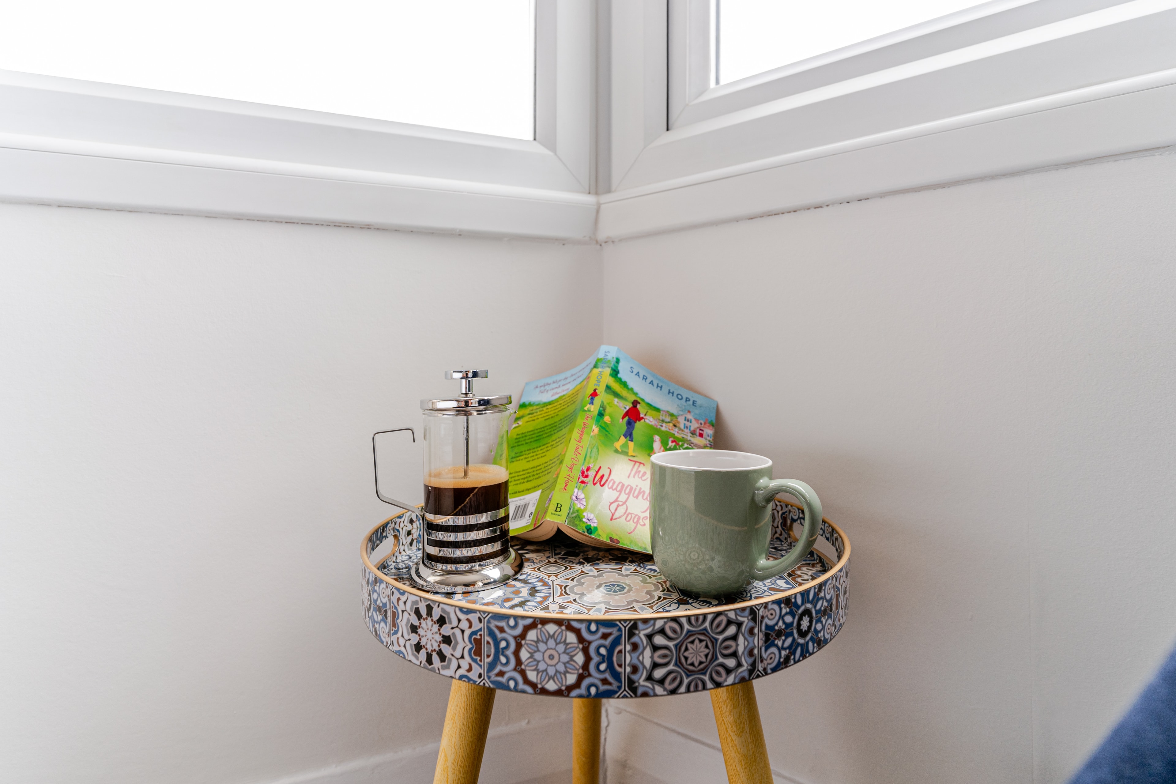 Bedroom 1 tiled bedside table with coffee press