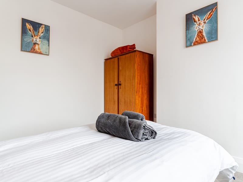 Bedroom 2 with hare artwork