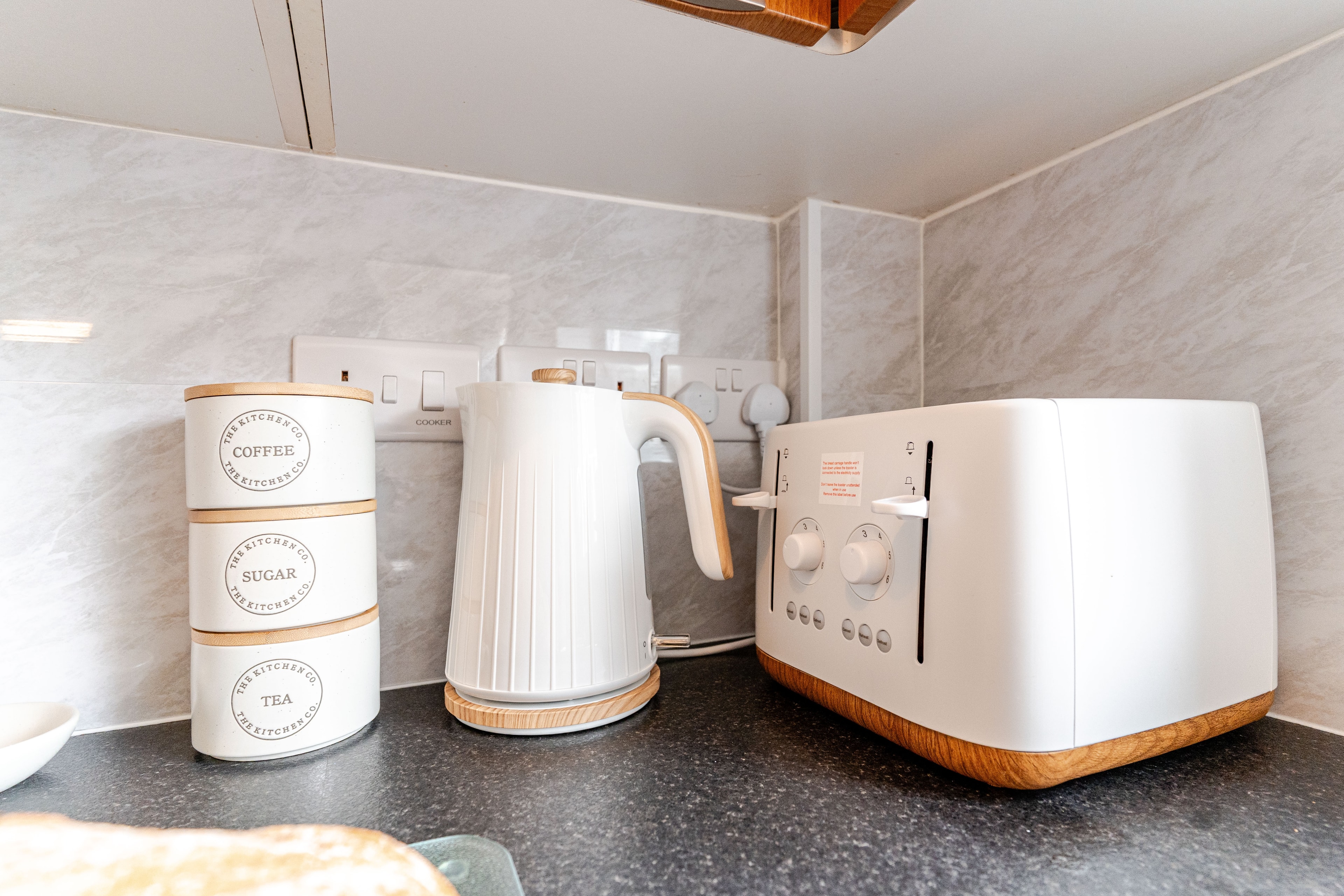 Kettle, toaster and tea, coffee and sugar station
